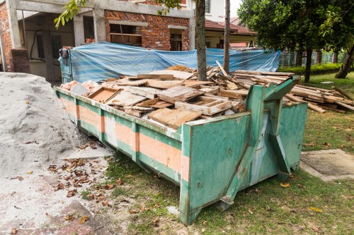 Team removing garden debris